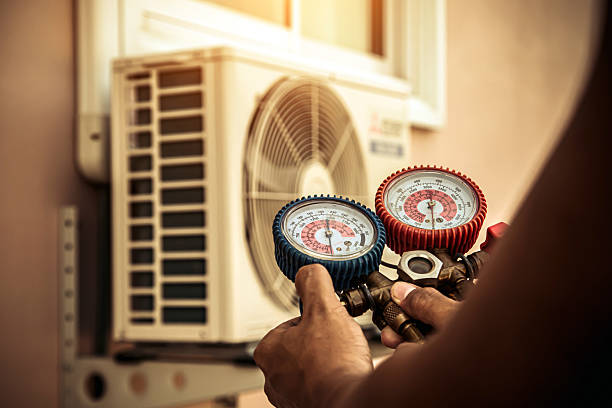 Professional Ac Installation technician working in West Newton, MA